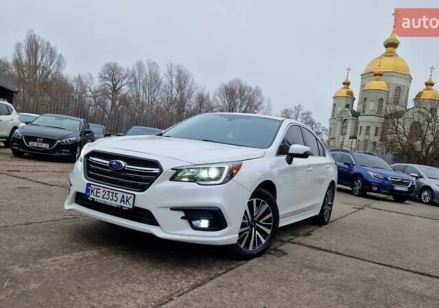 Белый Субару Легаси, объемом двигателя 2.5 л и пробегом 100 тыс. км за 14000 $, фото 1 на Automoto.ua