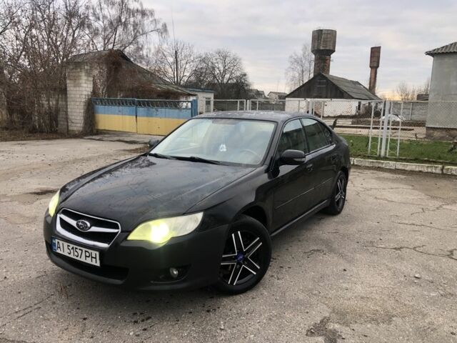 Черный Субару Легаси, объемом двигателя 2.5 л и пробегом 200 тыс. км за 3850 $, фото 1 на Automoto.ua