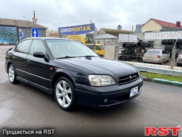 Черный Субару Легаси, объемом двигателя 2.5 л и пробегом 324 тыс. км за 3800 $, фото 1 на Automoto.ua