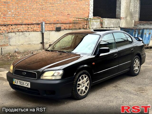 Черный Субару Легаси, объемом двигателя 2 л и пробегом 300 тыс. км за 2600 $, фото 1 на Automoto.ua