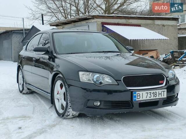 Черный Субару Легаси, объемом двигателя 3 л и пробегом 177 тыс. км за 10500 $, фото 1 на Automoto.ua