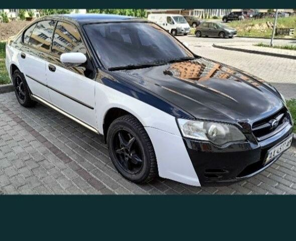 Черный Субару Легаси, объемом двигателя 3 л и пробегом 170 тыс. км за 1500 $, фото 1 на Automoto.ua