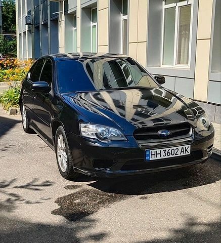 Черный Субару Легаси, объемом двигателя 1.99 л и пробегом 154 тыс. км за 5700 $, фото 1 на Automoto.ua