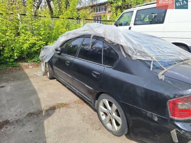 Черный Субару Легаси, объемом двигателя 2 л и пробегом 180 тыс. км за 2000 $, фото 1 на Automoto.ua