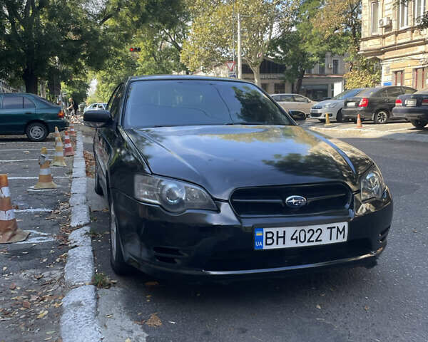 Черный Субару Легаси, объемом двигателя 1.99 л и пробегом 373 тыс. км за 3600 $, фото 1 на Automoto.ua