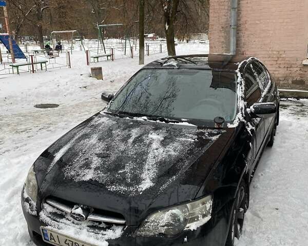 Чорний Субару Легасі, об'ємом двигуна 2.46 л та пробігом 213 тис. км за 5800 $, фото 1 на Automoto.ua