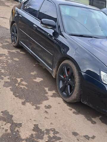 Черный Субару Легаси, объемом двигателя 2 л и пробегом 238 тыс. км за 5000 $, фото 1 на Automoto.ua