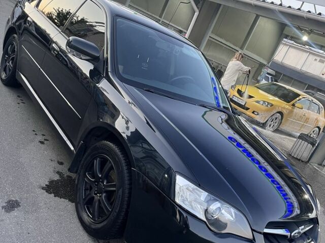 Чорний Субару Легасі, об'ємом двигуна 2 л та пробігом 217 тис. км за 5300 $, фото 1 на Automoto.ua