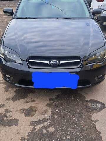 Черный Субару Легаси, объемом двигателя 2 л и пробегом 238 тыс. км за 5000 $, фото 1 на Automoto.ua