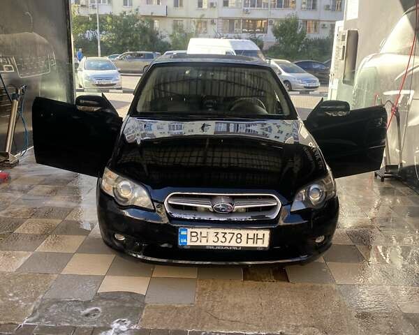 Черный Субару Легаси, объемом двигателя 1.99 л и пробегом 280 тыс. км за 4800 $, фото 1 на Automoto.ua
