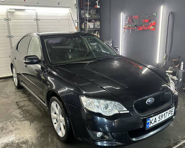Черный Субару Легаси, объемом двигателя 2.46 л и пробегом 285 тыс. км за 5200 $, фото 1 на Automoto.ua