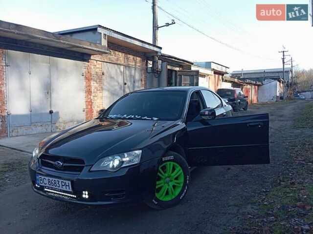 Чорний Субару Легасі, об'ємом двигуна 2.46 л та пробігом 370 тис. км за 4500 $, фото 1 на Automoto.ua