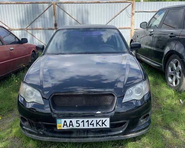 Черный Субару Легаси, объемом двигателя 2.46 л и пробегом 200 тыс. км за 4000 $, фото 1 на Automoto.ua