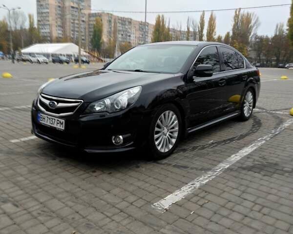 Черный Субару Легаси, объемом двигателя 2.46 л и пробегом 205 тыс. км за 8400 $, фото 1 на Automoto.ua