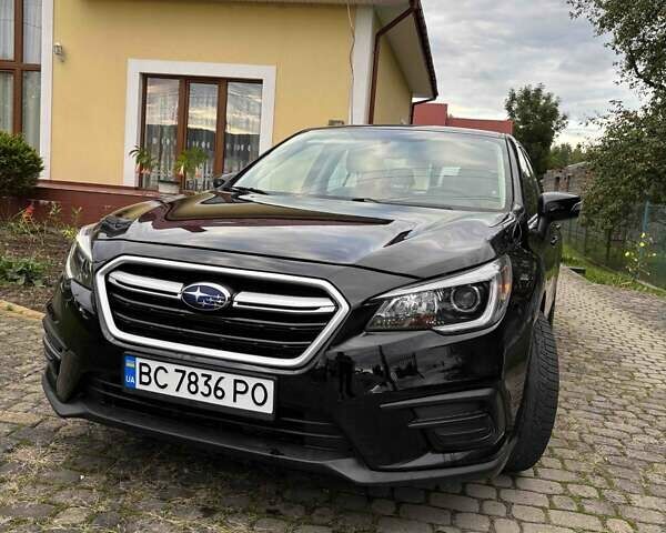 Чорний Субару Легасі, об'ємом двигуна 2.5 л та пробігом 155 тис. км за 12600 $, фото 1 на Automoto.ua