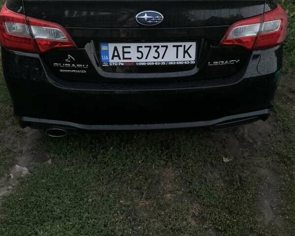 Черный Субару Легаси, объемом двигателя 2.46 л и пробегом 170 тыс. км за 16500 $, фото 1 на Automoto.ua