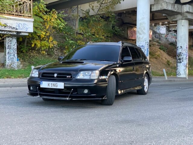 Черный Субару Легаси, объемом двигателя 2.5 л и пробегом 145 тыс. км за 4200 $, фото 1 на Automoto.ua