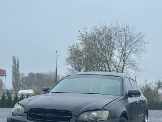 Черный Субару Легаси, объемом двигателя 2 л и пробегом 287 тыс. км за 2600 $, фото 1 на Automoto.ua