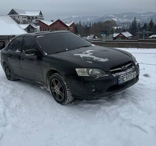 Черный Субару Легаси, объемом двигателя 2 л и пробегом 300 тыс. км за 6500 $, фото 1 на Automoto.ua