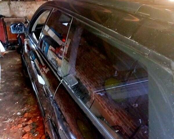 Черный Субару Легаси, объемом двигателя 2.5 л и пробегом 230 тыс. км за 3500 $, фото 1 на Automoto.ua