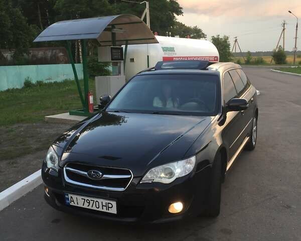 Чорний Субару Легасі, об'ємом двигуна 2 л та пробігом 353 тис. км за 5600 $, фото 1 на Automoto.ua