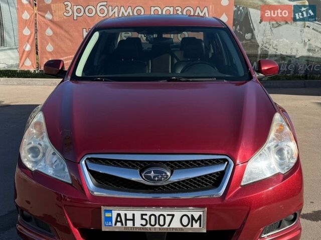 Красный Субару Легаси, объемом двигателя 2.46 л и пробегом 243 тыс. км за 8900 $, фото 1 на Automoto.ua