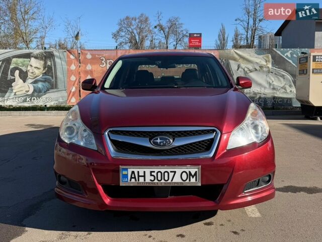 Красный Субару Легаси, объемом двигателя 2.46 л и пробегом 245 тыс. км за 7600 $, фото 1 на Automoto.ua