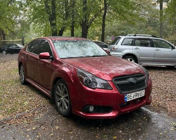 Красный Субару Легаси, объемом двигателя 2.46 л и пробегом 250 тыс. км за 7000 $, фото 1 на Automoto.ua