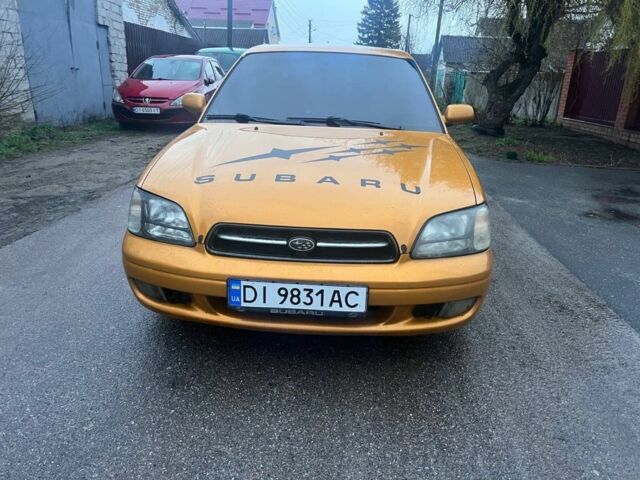 Желтый Субару Легаси, объемом двигателя 2.5 л и пробегом 450 тыс. км за 4150 $, фото 1 на Automoto.ua