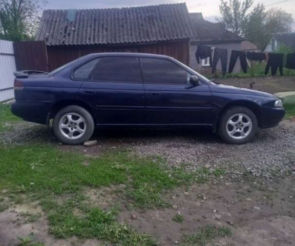 Синій Субару Легасі, об'ємом двигуна 2 л та пробігом 250 тис. км за 2012 $, фото 1 на Automoto.ua