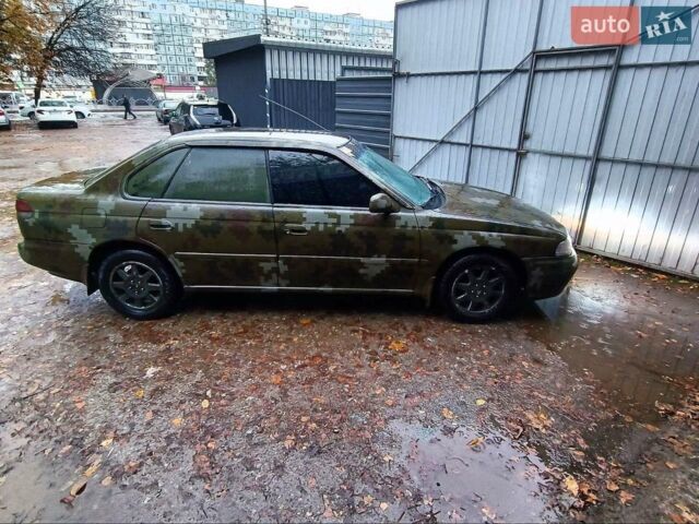 Синий Субару Легаси, объемом двигателя 2 л и пробегом 429 тыс. км за 3200 $, фото 1 на Automoto.ua
