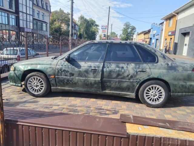 Зелений Субару Легасі, об'ємом двигуна 2 л та пробігом 200 тис. км за 1794 $, фото 1 на Automoto.ua