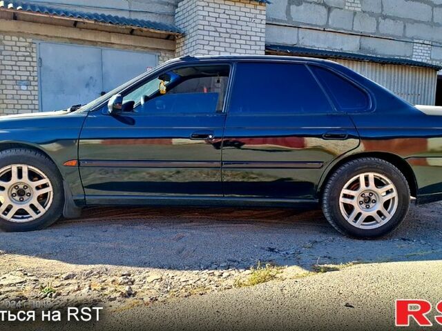 Зеленый Субару Легаси, объемом двигателя 2 л и пробегом 366 тыс. км за 3500 $, фото 1 на Automoto.ua