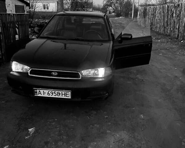 Зеленый Субару Легаси, объемом двигателя 2.46 л и пробегом 300 тыс. км за 1770 $, фото 1 на Automoto.ua