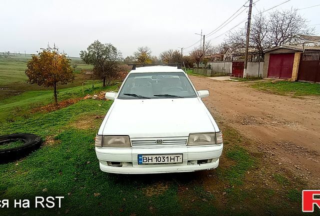 Белый Субару Леон, объемом двигателя 1.8 л и пробегом 350 тыс. км за 700 $, фото 1 на Automoto.ua