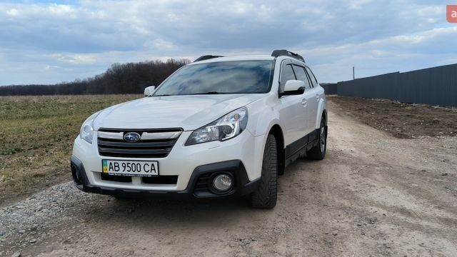 Белый Субару Аутбек, объемом двигателя 2.46 л и пробегом 76 тыс. км за 15000 $, фото 1 на Automoto.ua