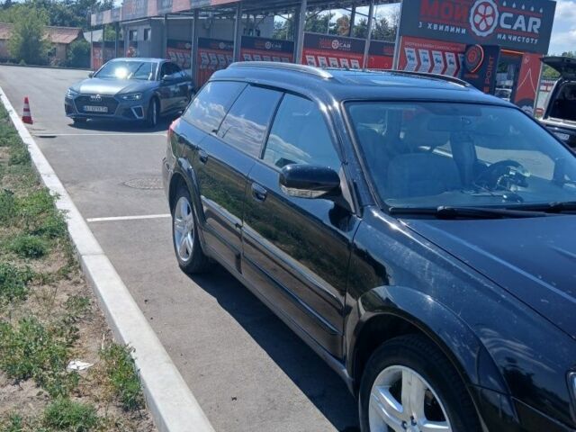 Черный Субару Аутбек, объемом двигателя 3 л и пробегом 260 тыс. км за 7000 $, фото 1 на Automoto.ua