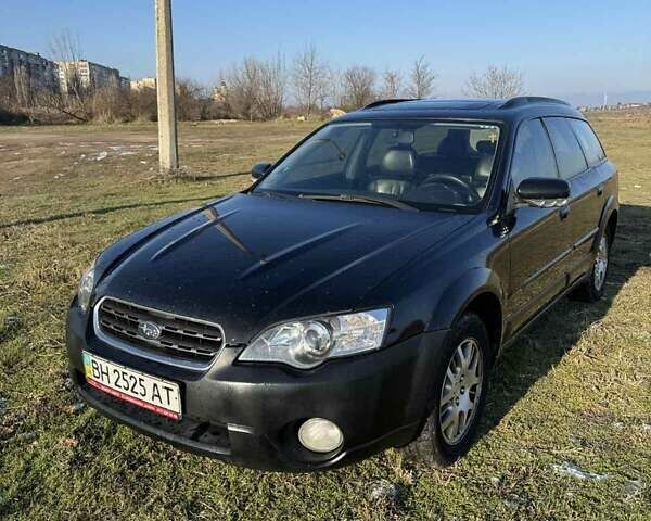 Черный Субару Аутбек, объемом двигателя 2.46 л и пробегом 370 тыс. км за 4800 $, фото 1 на Automoto.ua