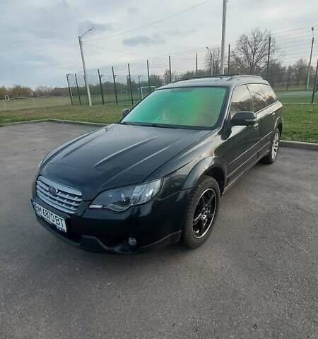 Черный Субару Аутбек, объемом двигателя 3 л и пробегом 325 тыс. км за 8500 $, фото 1 на Automoto.ua