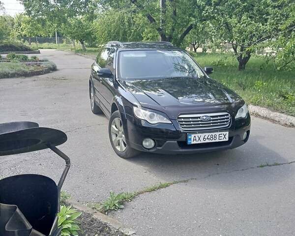 Черный Субару Аутбек, объемом двигателя 2.46 л и пробегом 262 тыс. км за 6400 $, фото 1 на Automoto.ua