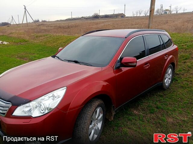 Красный Субару Аутбек, объемом двигателя 2.5 л и пробегом 110 тыс. км за 12600 $, фото 1 на Automoto.ua