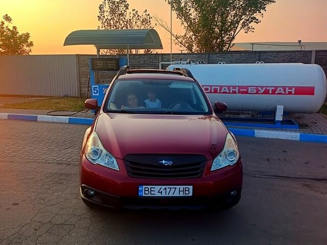 Красный Субару Аутбек, объемом двигателя 2.5 л и пробегом 260 тыс. км за 10500 $, фото 1 на Automoto.ua