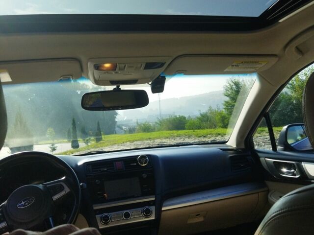 Красный Субару Аутбек, объемом двигателя 2.5 л и пробегом 168 тыс. км за 14300 $, фото 1 на Automoto.ua