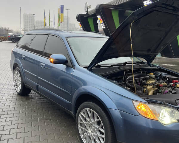 Синий Субару Аутбек, объемом двигателя 2.46 л и пробегом 128 тыс. км за 11400 $, фото 1 на Automoto.ua