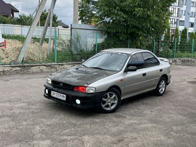 Серый Субару Impreza WRX, объемом двигателя 2 л и пробегом 250 тыс. км за 1700 $, фото 1 на Automoto.ua