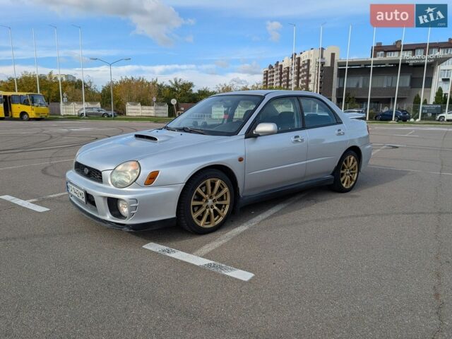 Сірий Субару Impreza WRX, об'ємом двигуна 2 л та пробігом 240 тис. км за 13999 $, фото 1 на Automoto.ua