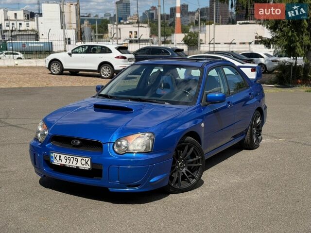 Синий Субару Impreza WRX, объемом двигателя 1.99 л и пробегом 303 тыс. км за 12000 $, фото 1 на Automoto.ua