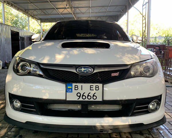 Белый Субару Импреза ВРХ СТИ, объемом двигателя 2.46 л и пробегом 84 тыс. км за 20000 $, фото 1 на Automoto.ua