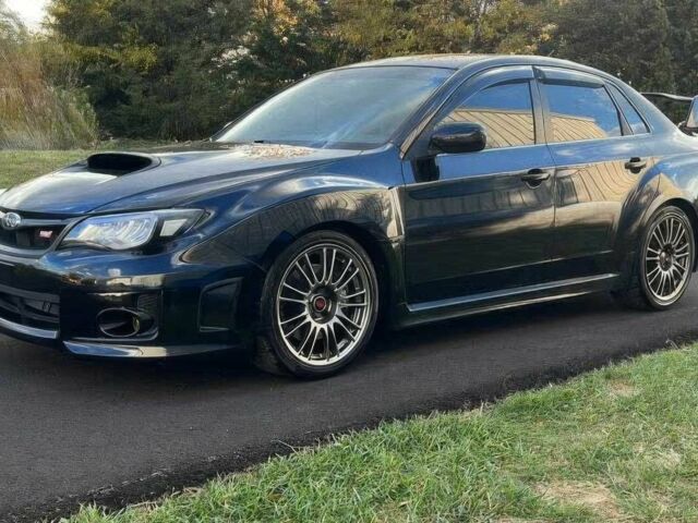 Чорний Субару Імпреза ВРХ СТІ, об'ємом двигуна 2.5 л та пробігом 84 тис. км за 8000 $, фото 1 на Automoto.ua