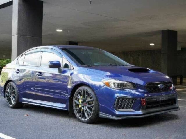 Синий Субару Импреза ВРХ СТИ, объемом двигателя 2.5 л и пробегом 90 тыс. км за 11000 $, фото 1 на Automoto.ua